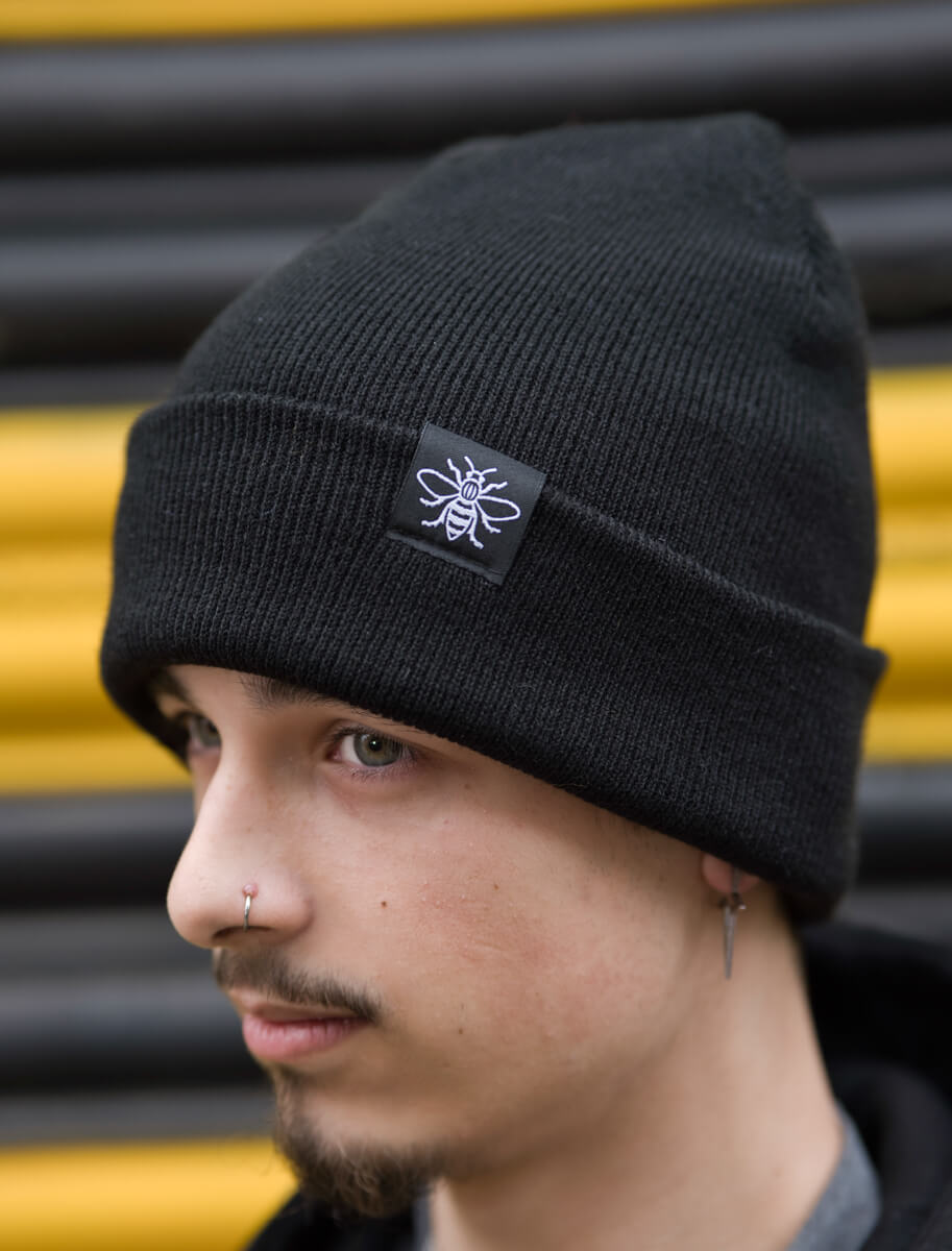*Black Beanie with Manchester Bee Tag (Staff) • The Manchester Shop