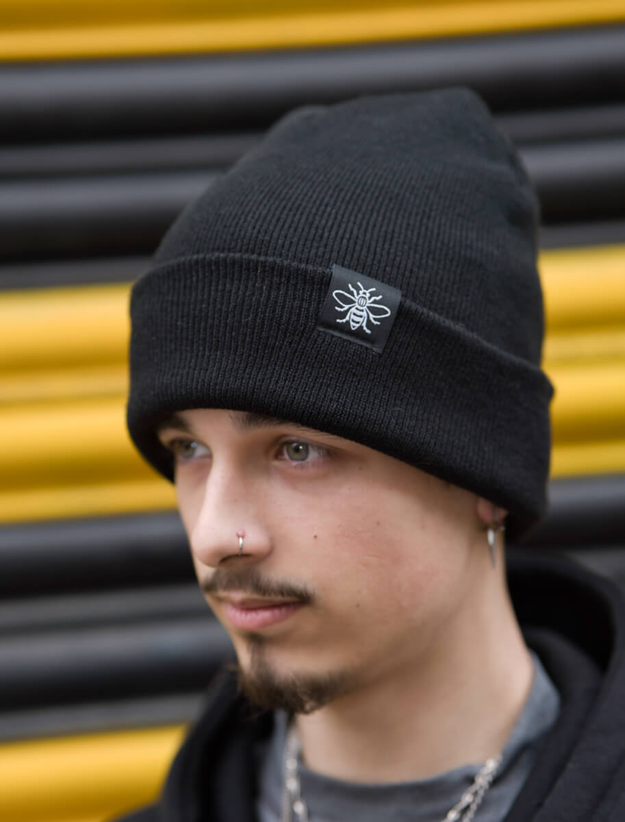 *Black Beanie with Manchester Bee Tag (Staff) • The Manchester Shop