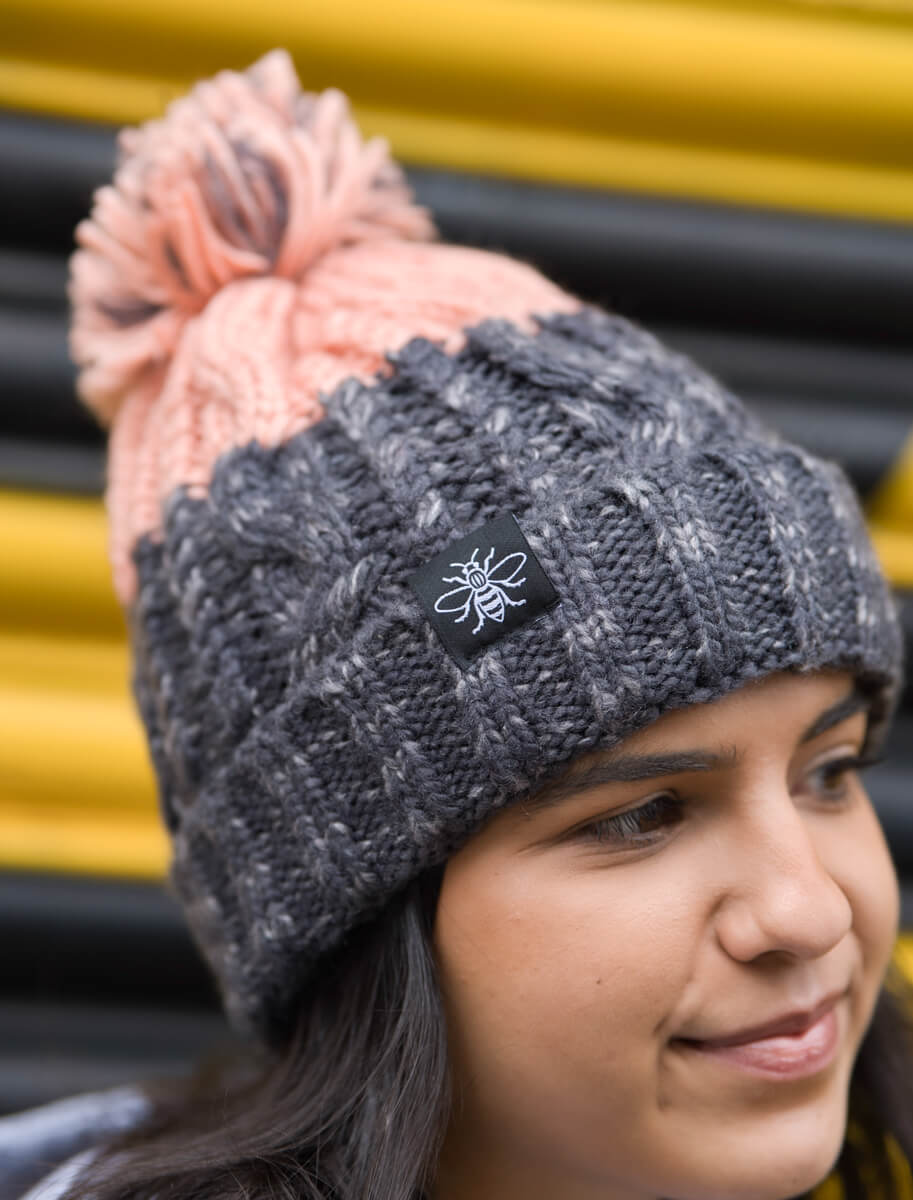 *Blush & Grey Chunky Knit Bee Beanie with Bobble (Staff) • The Manchester Shop