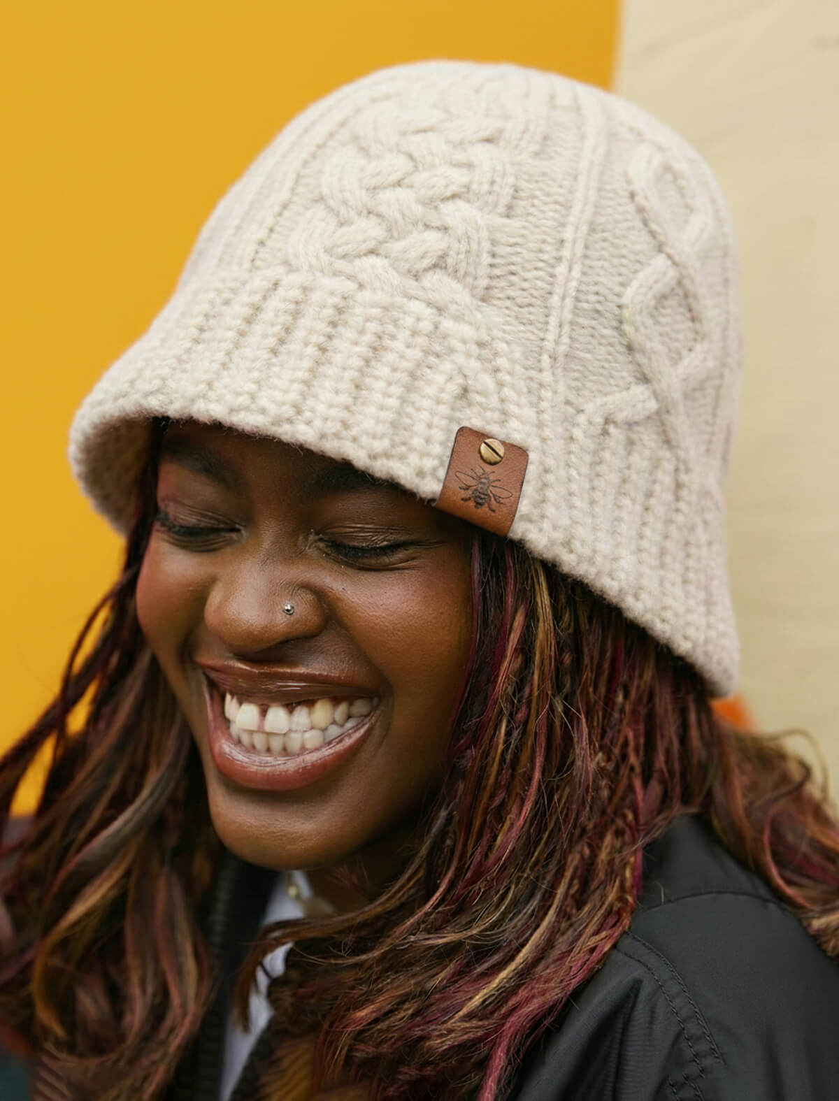 Cream Aran Cable Knitted Bee Tag Bucket Hat • The Manchester Shop