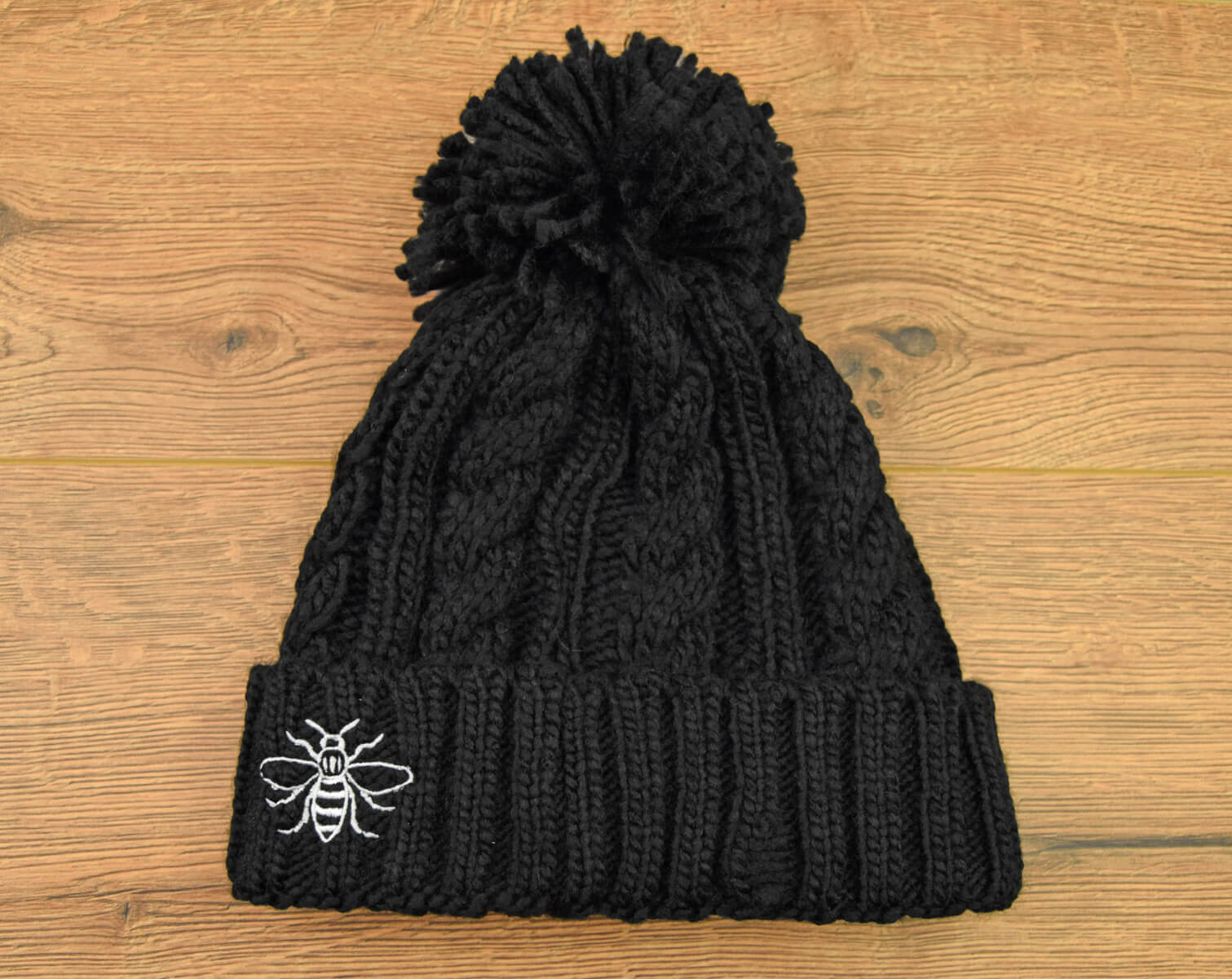 Black Chunky Knit Bee Beanie with Bobble | The Manchester Shop