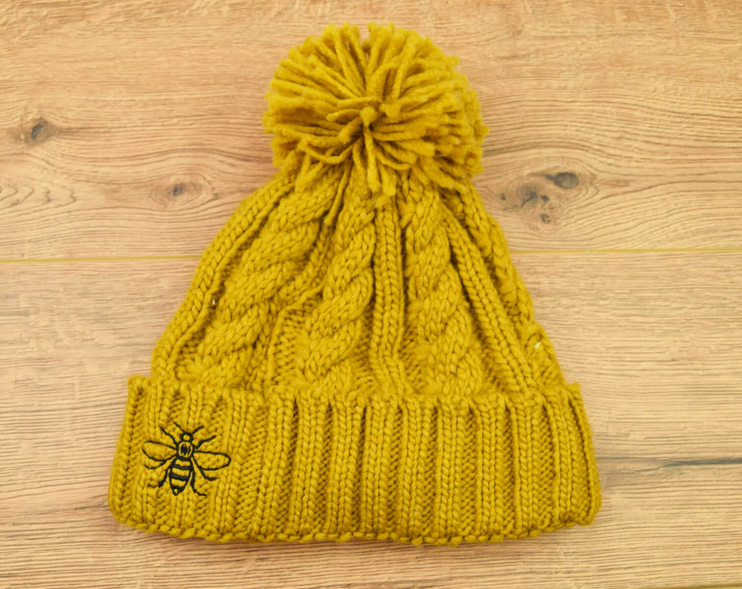 Mustard Chunky Knit Bee Beanie with Bobble | The Manchester Shop